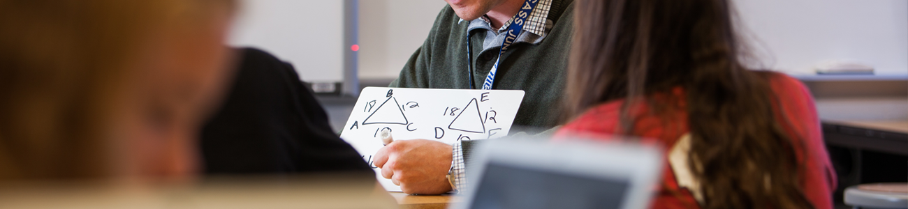 math teacher solving problems 
